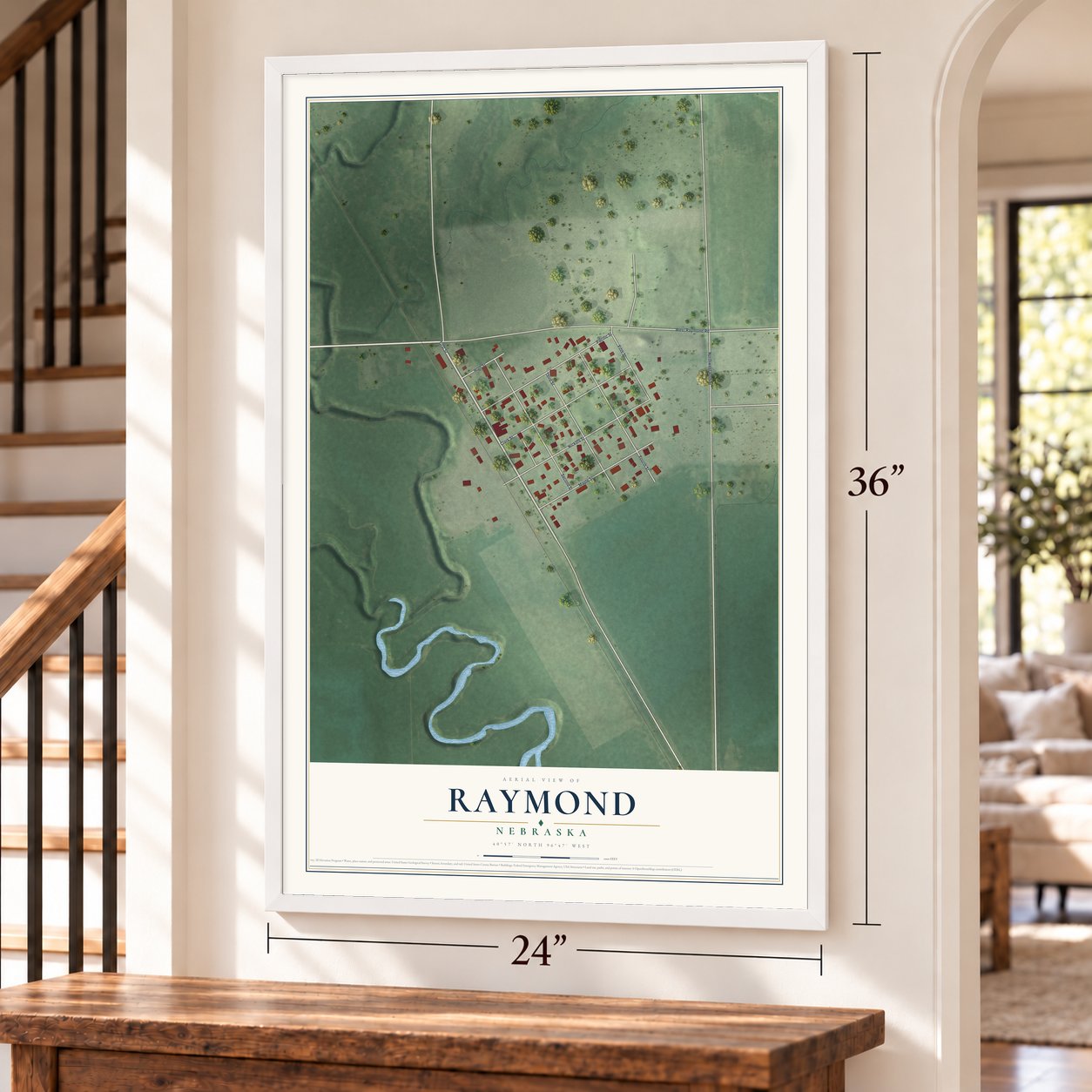 Raymond, Nebraska map, 24 x 36 inch print in a white frame by a staircase