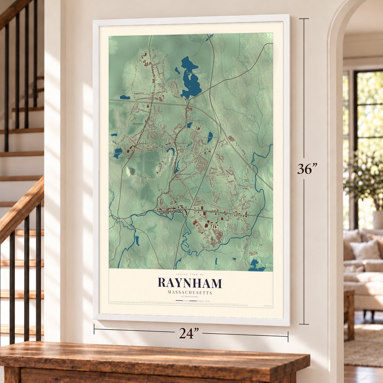 Raynham, Massachusetts map, 24 x 36 inch print in a white frame by a staircase