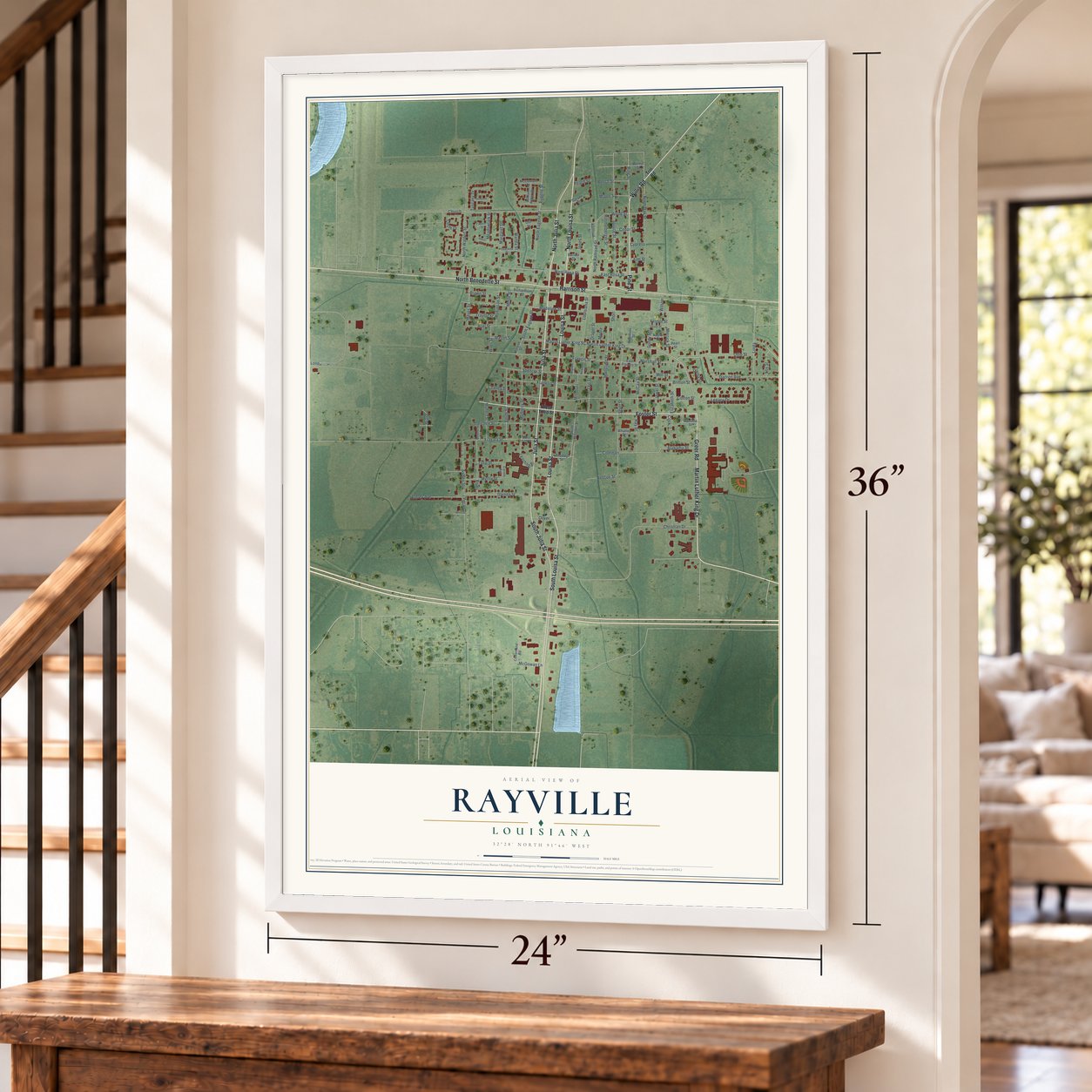 Rayville, Louisiana map, 24 x 36 inch print in a white frame by a staircase