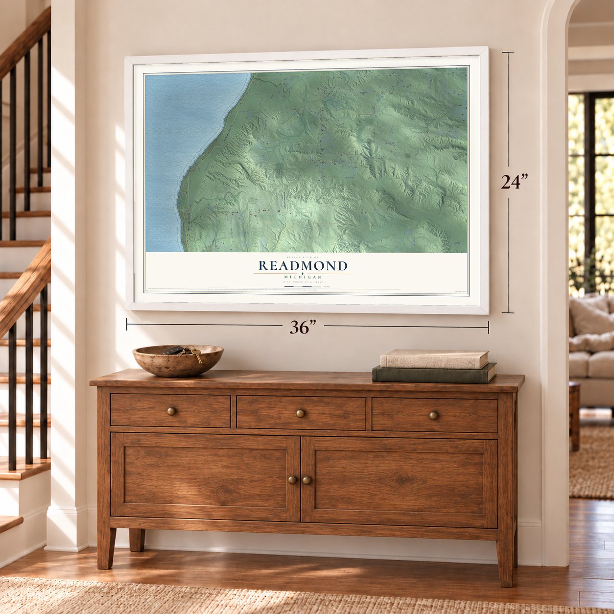 Readmond, Michigan map, 24 x 36 inch print in a white frame above a dresser by a staircase