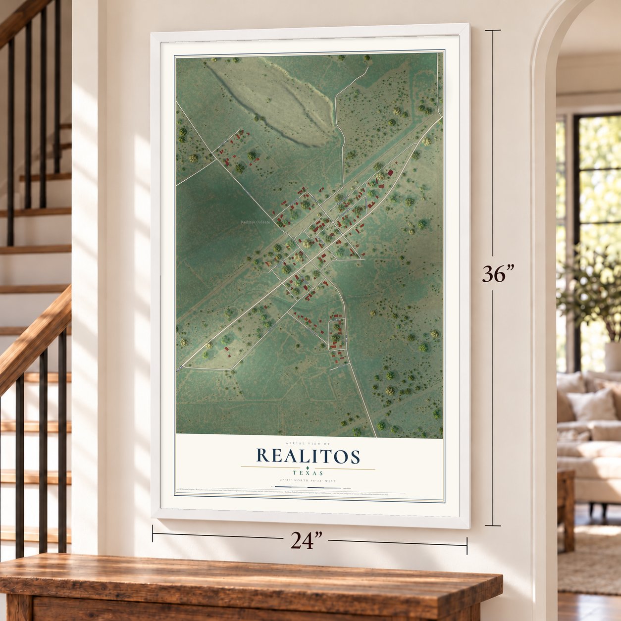 Realitos, Texas map, 24 x 36 inch print in a white frame by a staircase