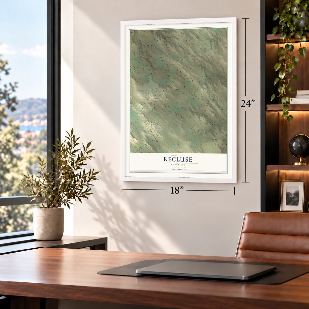 Recluse, Wyoming map, 18 x 24 inch print in a white frame in a home office