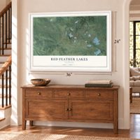 Red Feather Lakes, Colorado map, 24 x 36 inch print in a white frame above a dresser by a staircase