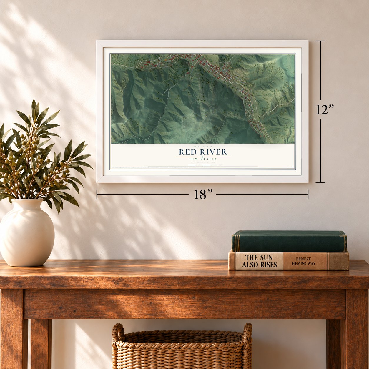 Red River, New Mexico map, 12 x 18 inch print in a white frame in an entryway
