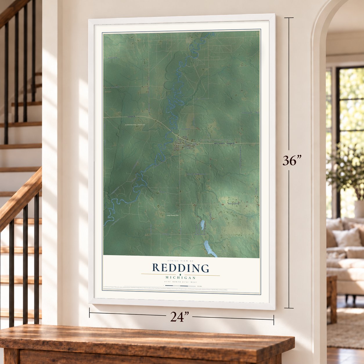 Redding, Michigan map, 24 x 36 inch print in a white frame by a staircase