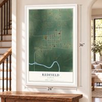 Redfield, Kansas map, 24 x 36 inch print in a white frame by a staircase