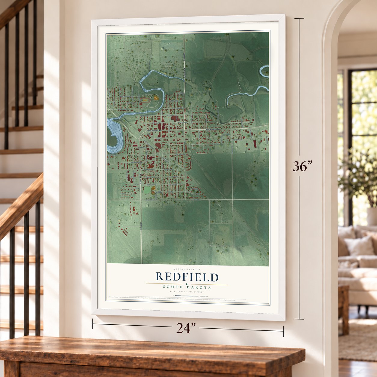Redfield, South Dakota map, 24 x 36 inch print in a white frame by a staircase