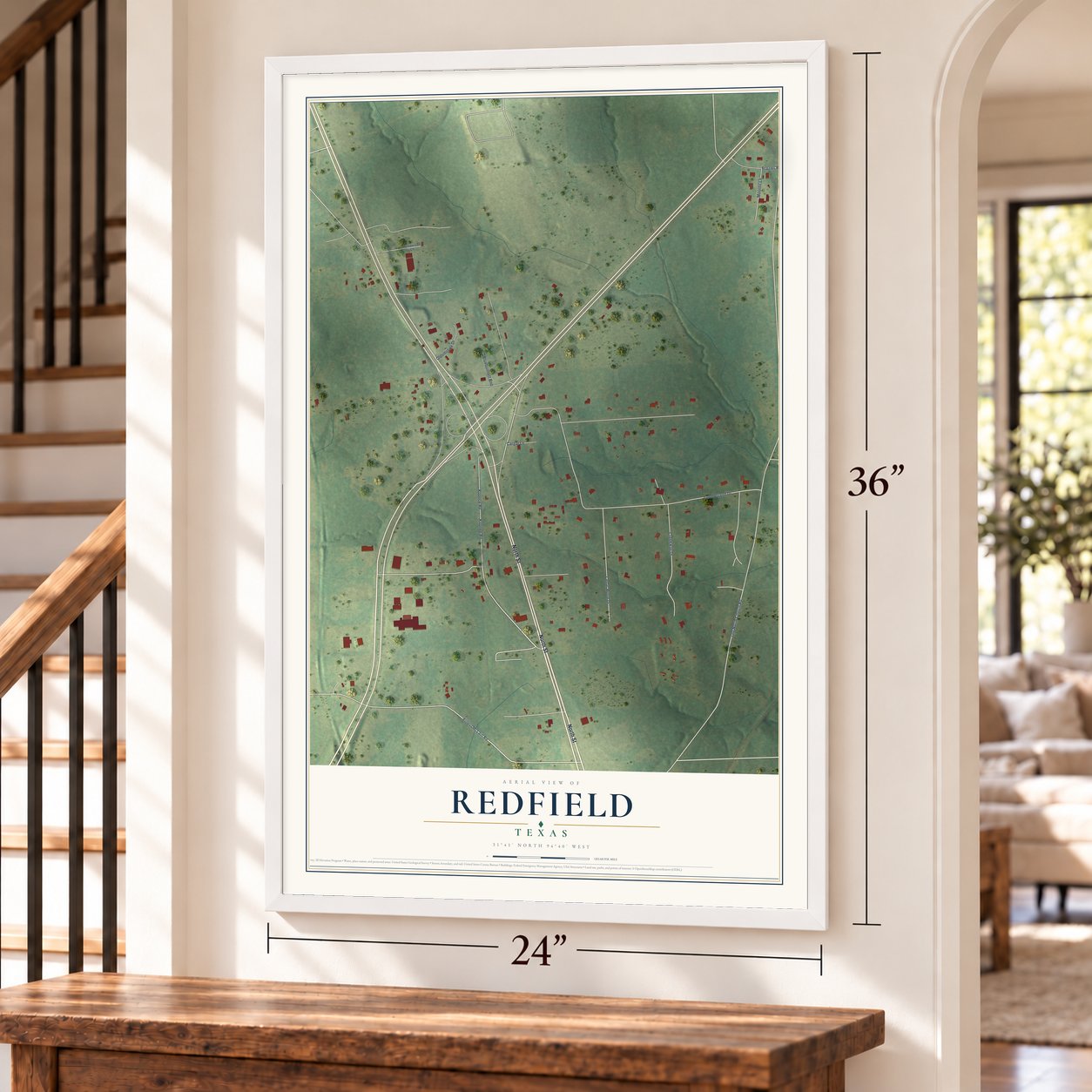 Redfield, Texas map, 24 x 36 inch print in a white frame by a staircase