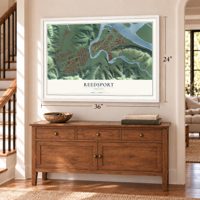 Reedsport, Oregon map, 24 x 36 inch print in a white frame above a dresser by a staircase
