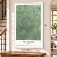 Reeltown, Alabama map, 24 x 36 inch print in a white frame by a staircase