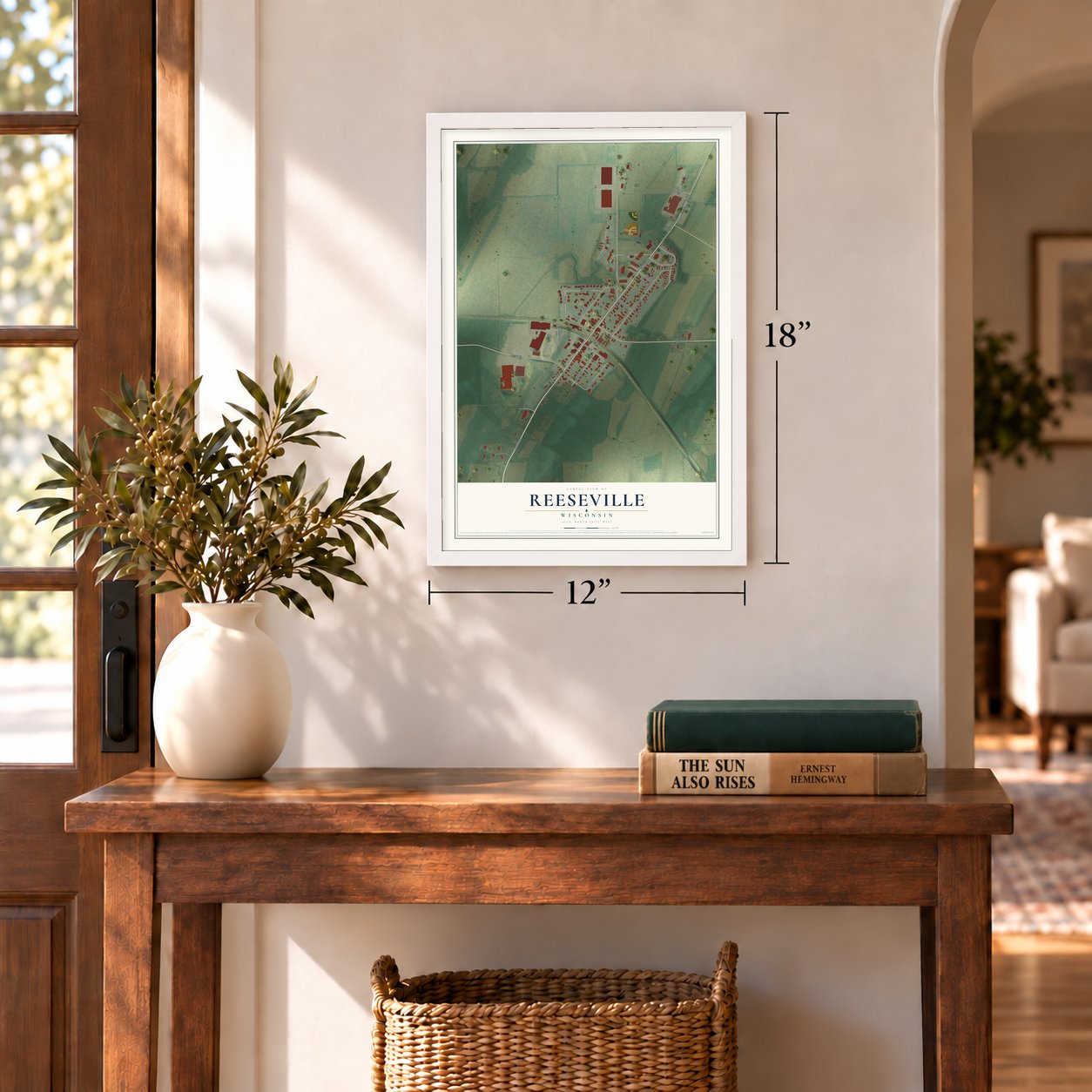 Reeseville, Wisconsin map, 12 x 18 inch print in a white frame in an entryway