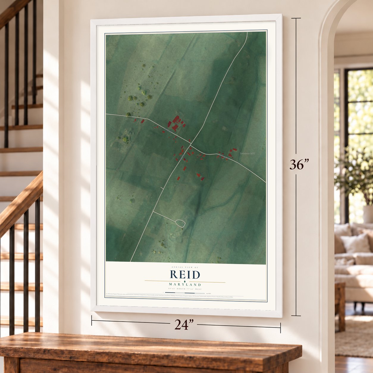 Reid, Maryland map, 24 x 36 inch print in a white frame by a staircase