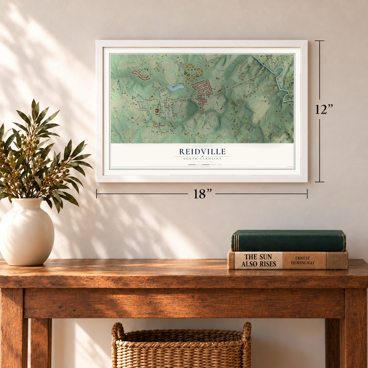 Reidville, South Carolina map, 12 x 18 inch print in a white frame in an entryway