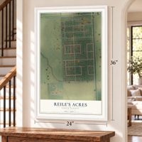 Reile's Acres, North Dakota map, 24 x 36 inch print in a white frame by a staircase