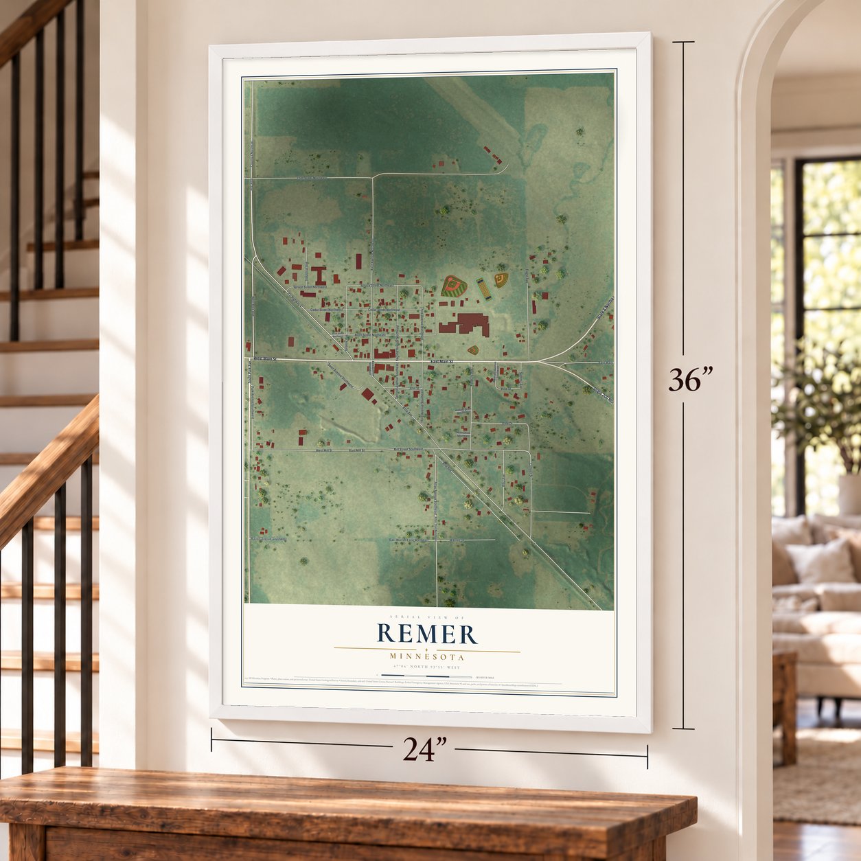 Remer, Minnesota map, 24 x 36 inch print in a white frame by a staircase