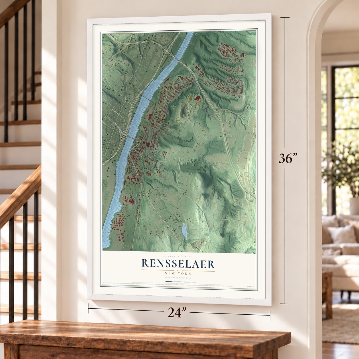 Rensselaer, New York map, 24 x 36 inch print in a white frame by a staircase