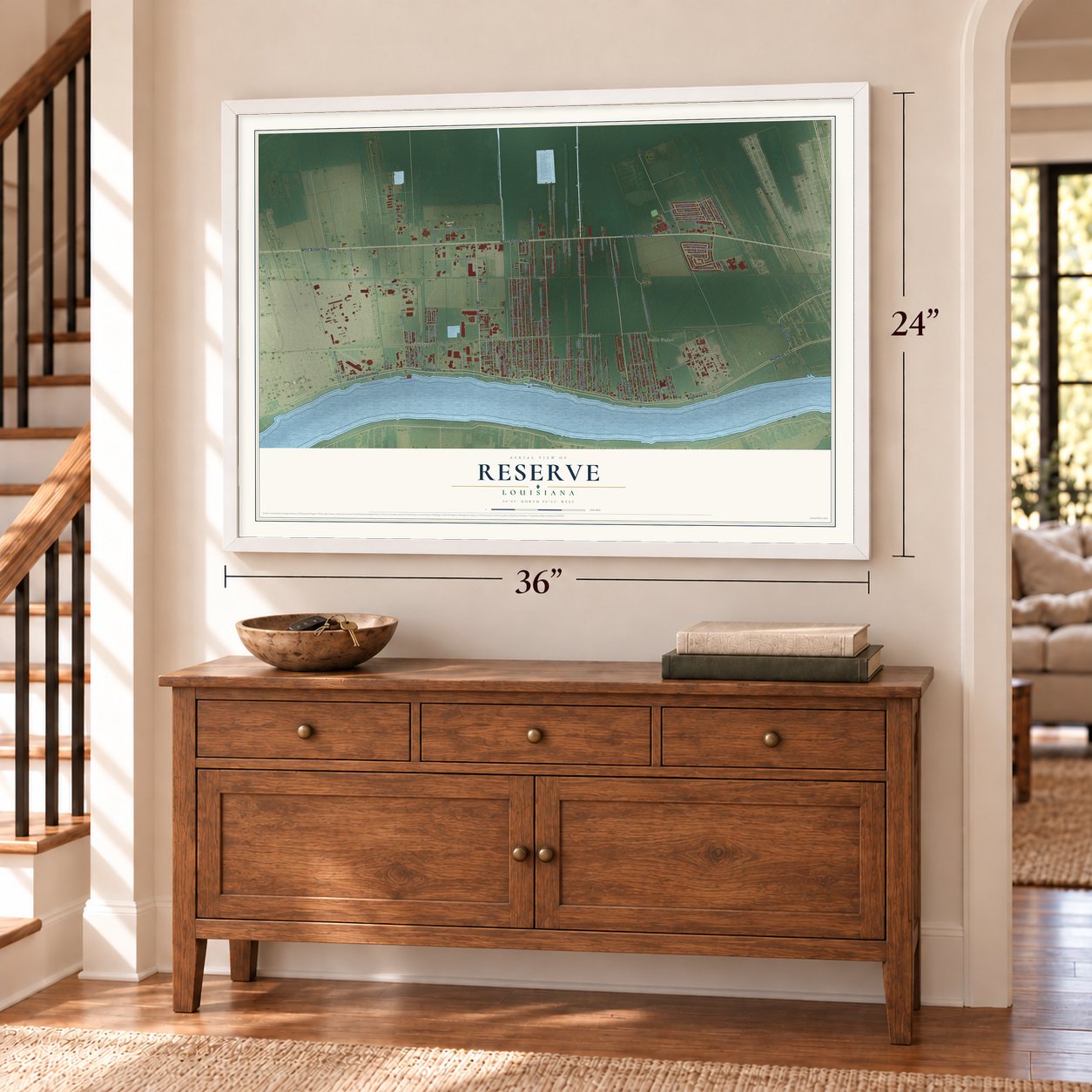 Reserve, Louisiana map, 24 x 36 inch print in a white frame above a dresser by a staircase