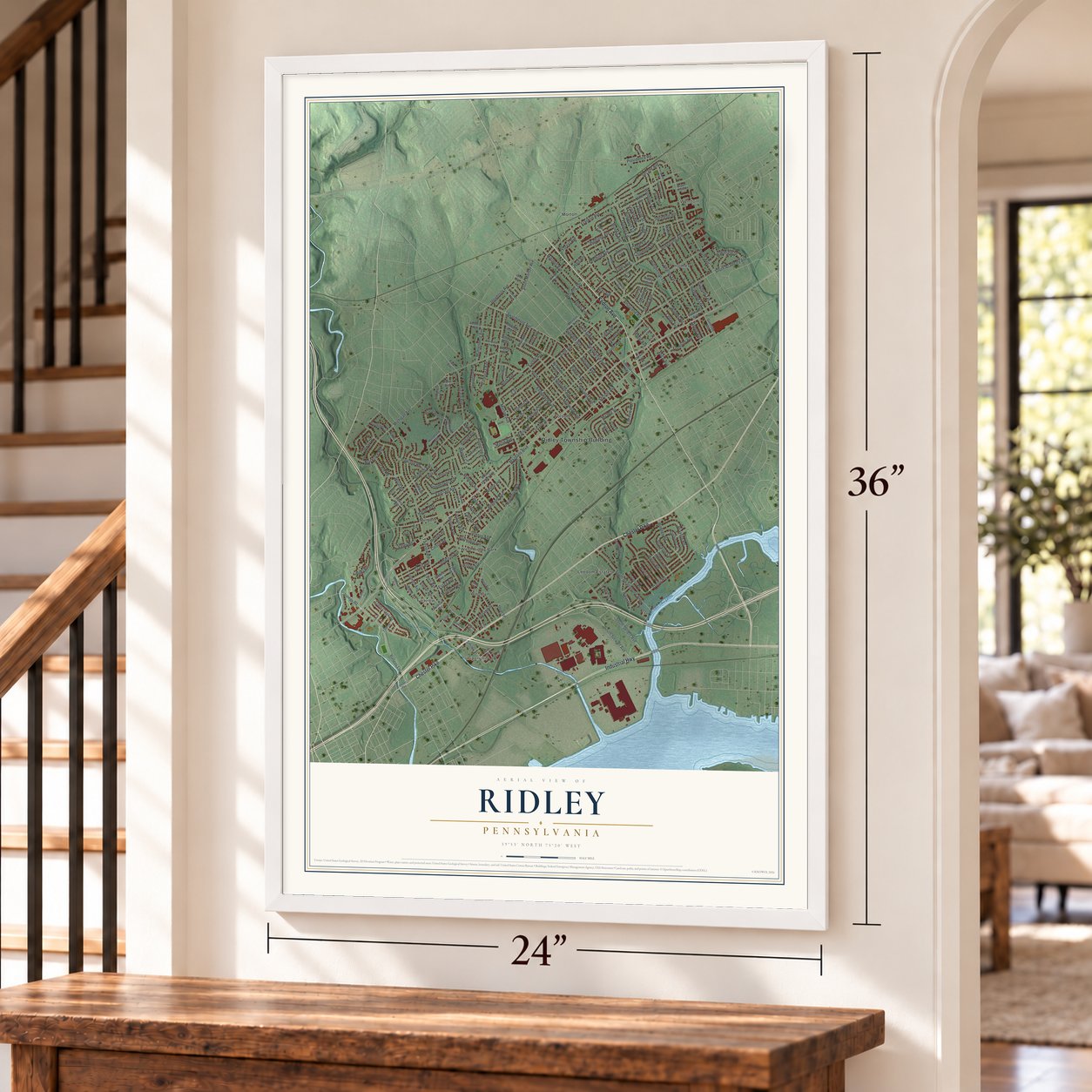 Ridley, Pennsylvania map, 24 x 36 inch print in a white frame by a staircase