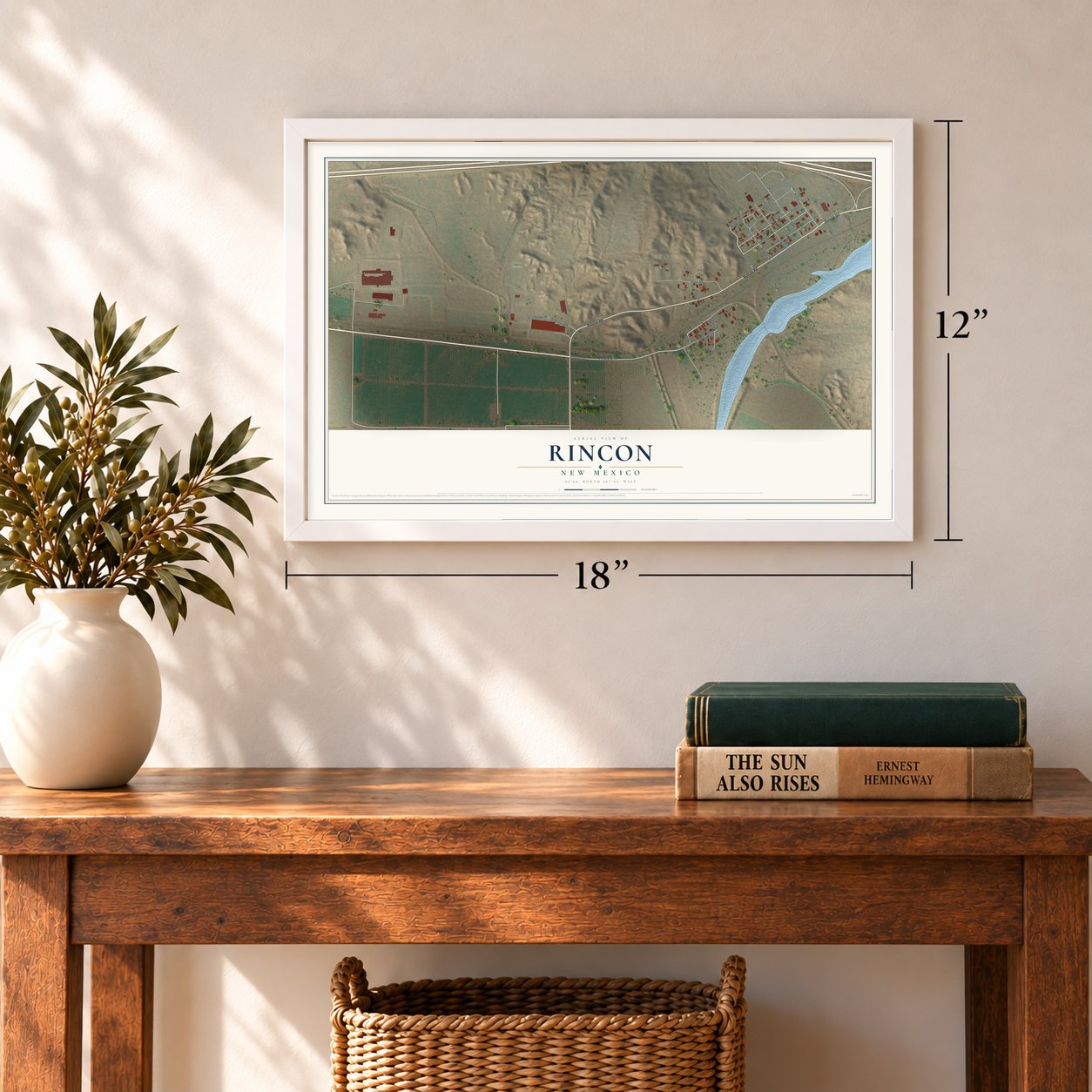 Rincon, New Mexico map, 12 x 18 inch print in a white frame in an entryway
