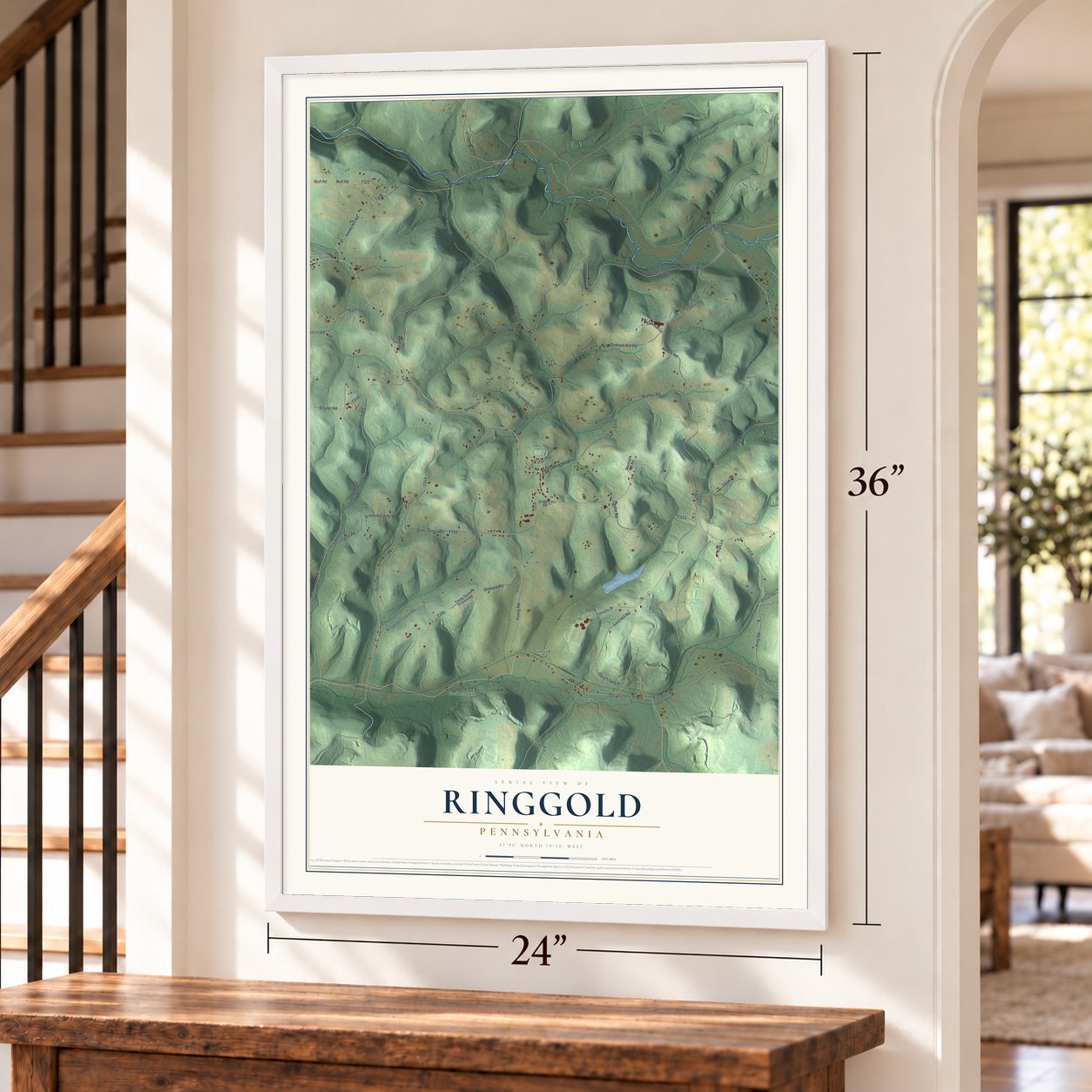 Ringgold, Pennsylvania map, 24 x 36 inch print in a white frame by a staircase