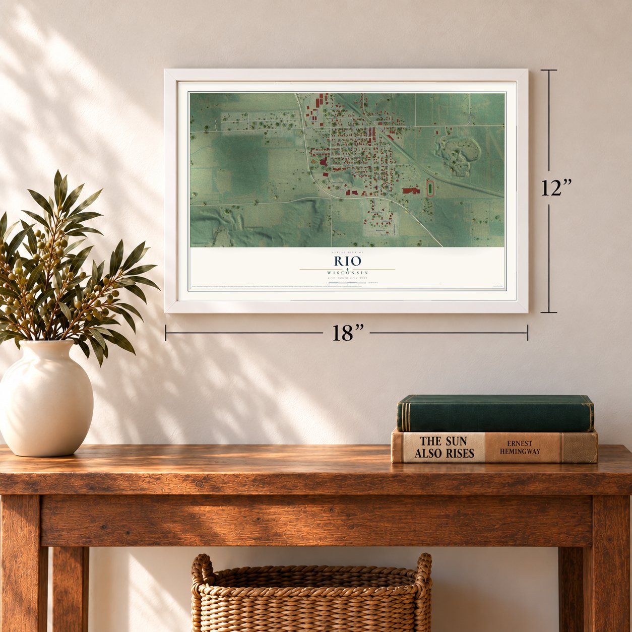 Rio, Wisconsin map, 12 x 18 inch print in a white frame in an entryway