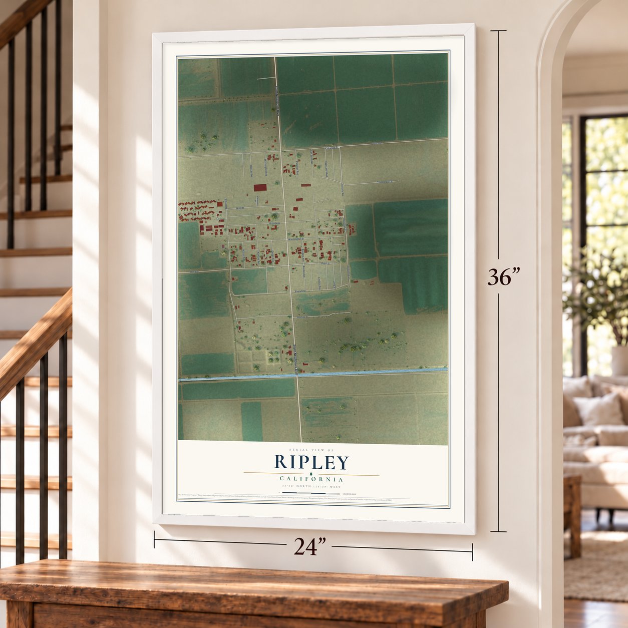 Ripley, California map, 24 x 36 inch print in a white frame by a staircase