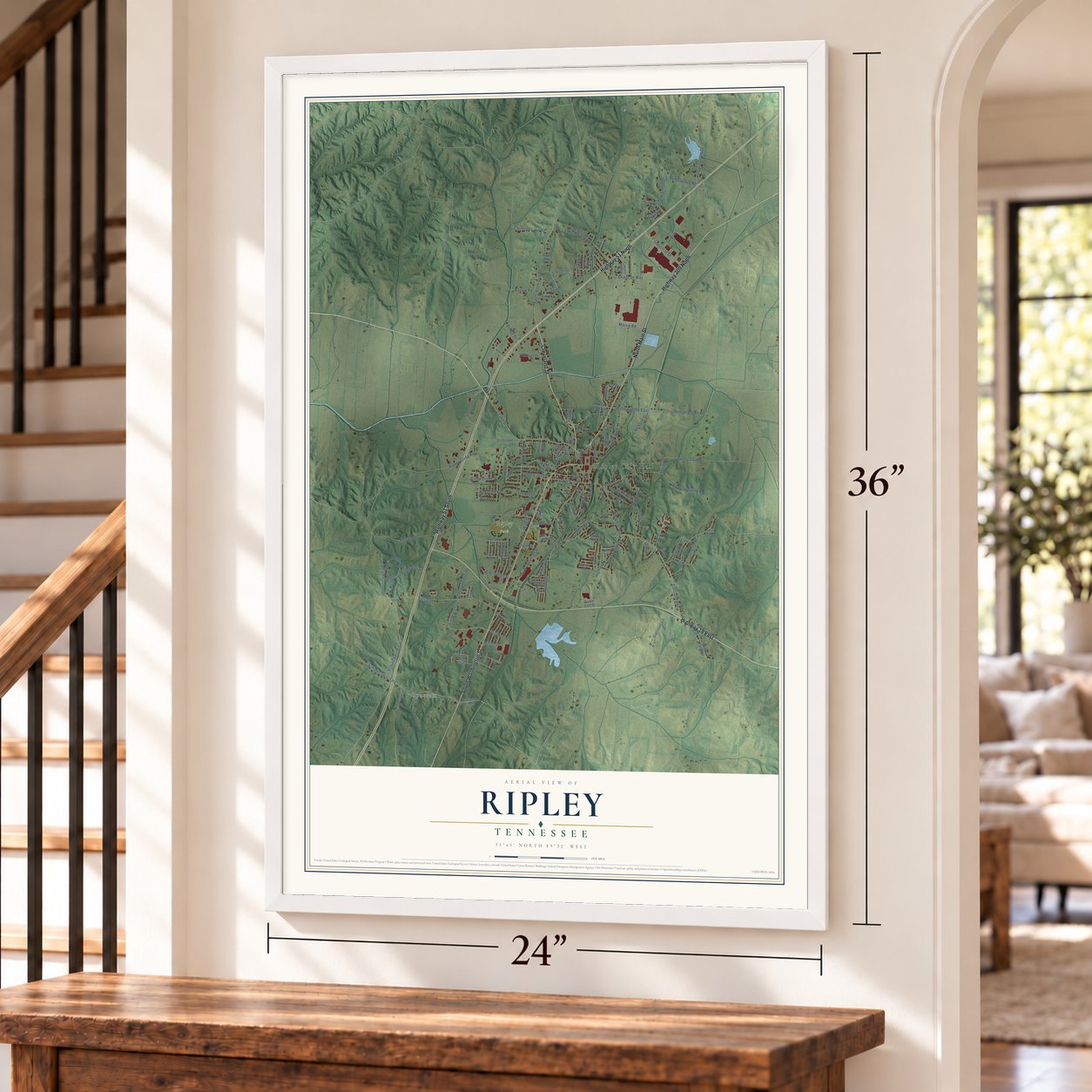 Ripley, Tennessee map, 24 x 36 inch print in a white frame by a staircase