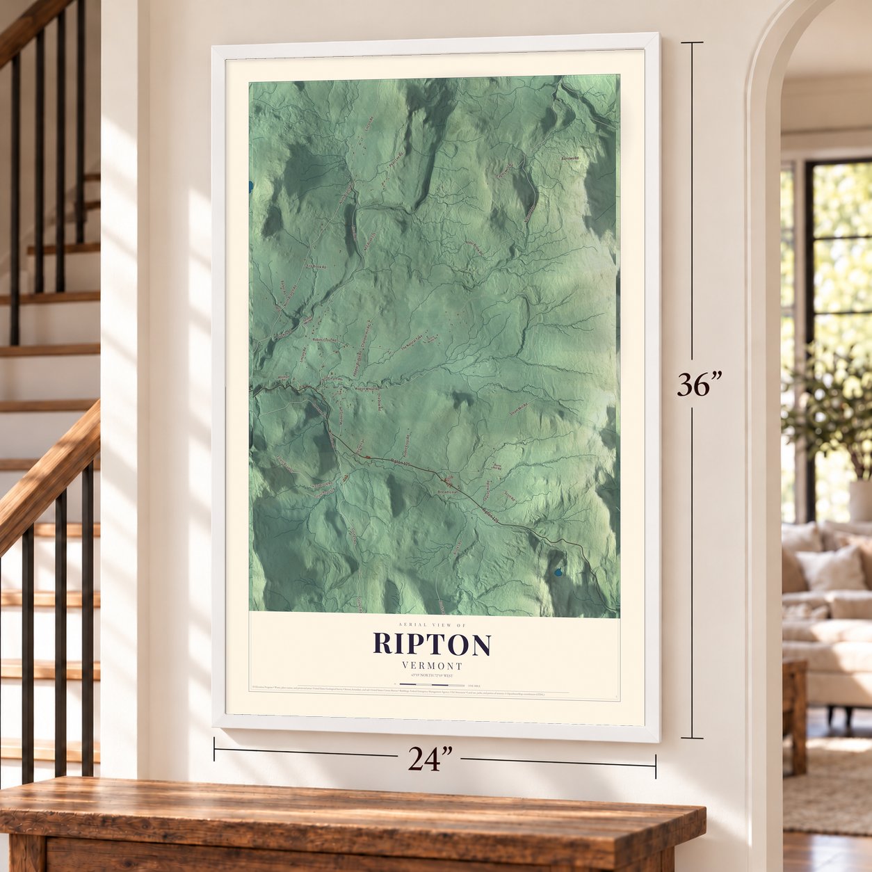 Ripton, Vermont map, 24 x 36 inch print in a white frame by a staircase