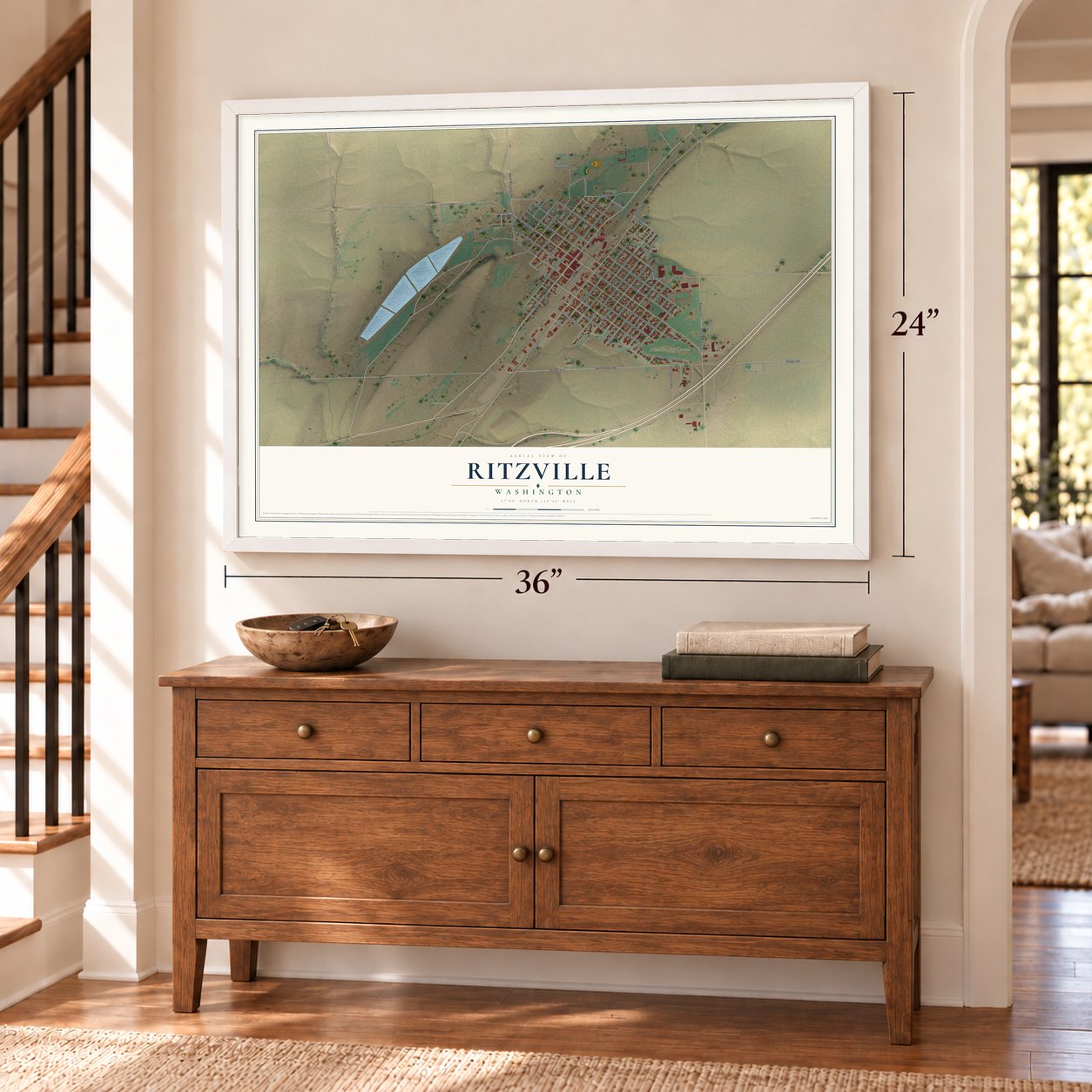 Ritzville, Washington map, 24 x 36 inch print in a white frame above a dresser by a staircase