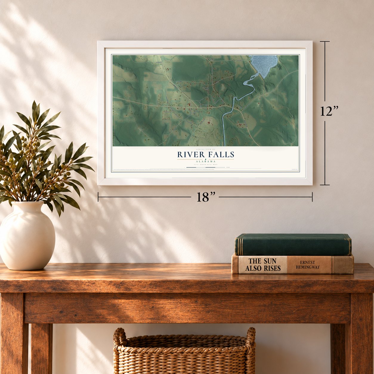 River Falls, Alabama map, 12 x 18 inch print in a white frame in an entryway