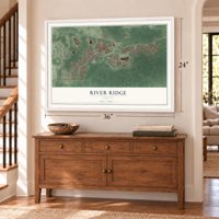 River Ridge, Florida map, 24 x 36 inch print in a white frame above a dresser by a staircase