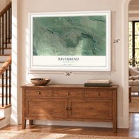 Riverbend, Washington map, 24 x 36 inch print in a white frame above a dresser by a staircase