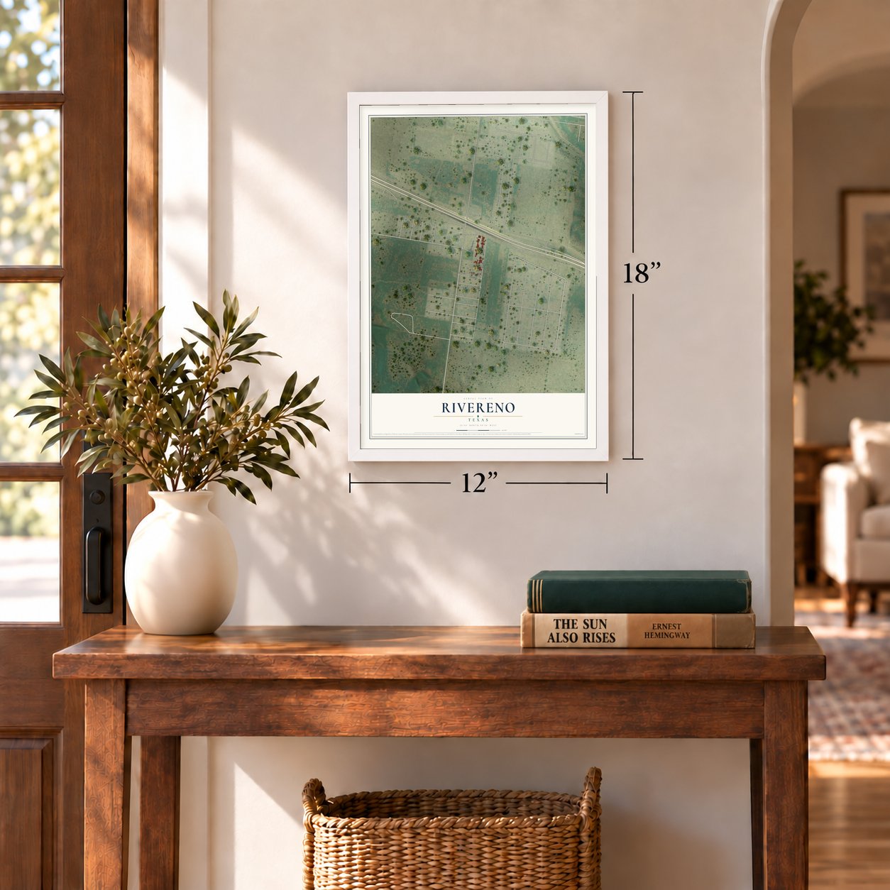 Rivereno, Texas map, 12 x 18 inch print in a white frame in an entryway