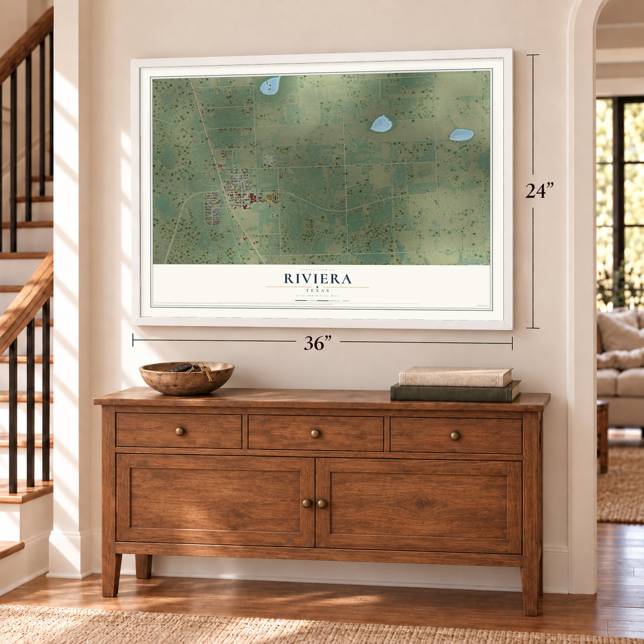 Riviera, Texas map, 24 x 36 inch print in a white frame above a dresser by a staircase