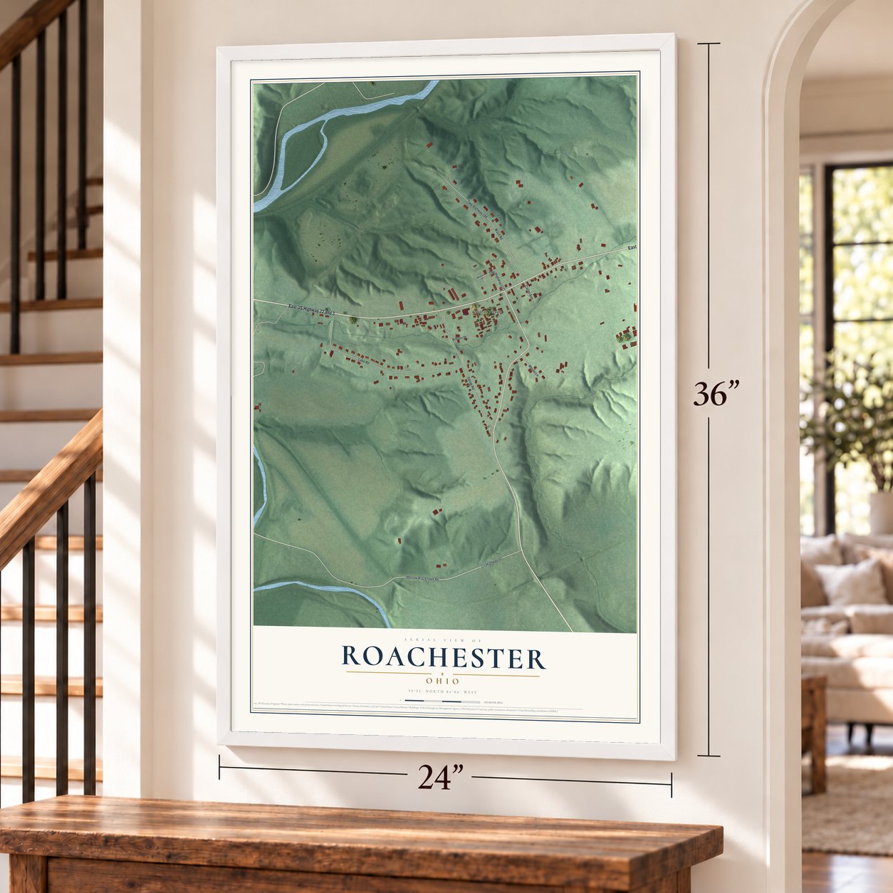 Roachester, Ohio map, 24 x 36 inch print in a white frame by a staircase