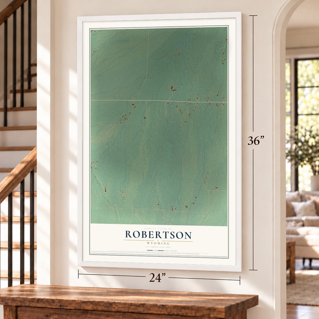 Robertson, Wyoming map, 24 x 36 inch print in a white frame by a staircase