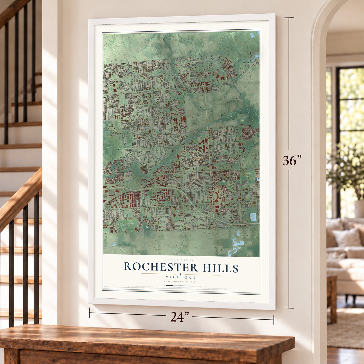 Rochester Hills, Michigan map, 24 x 36 inch print in a white frame by a staircase