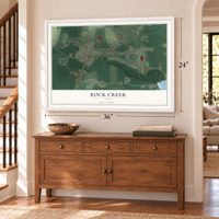 Rock Creek, Ohio map, 24 x 36 inch print in a white frame above a dresser by a staircase