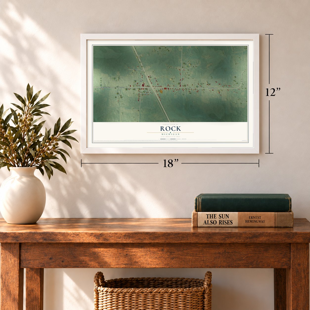 Rock, Michigan map, 12 x 18 inch print in a white frame in an entryway