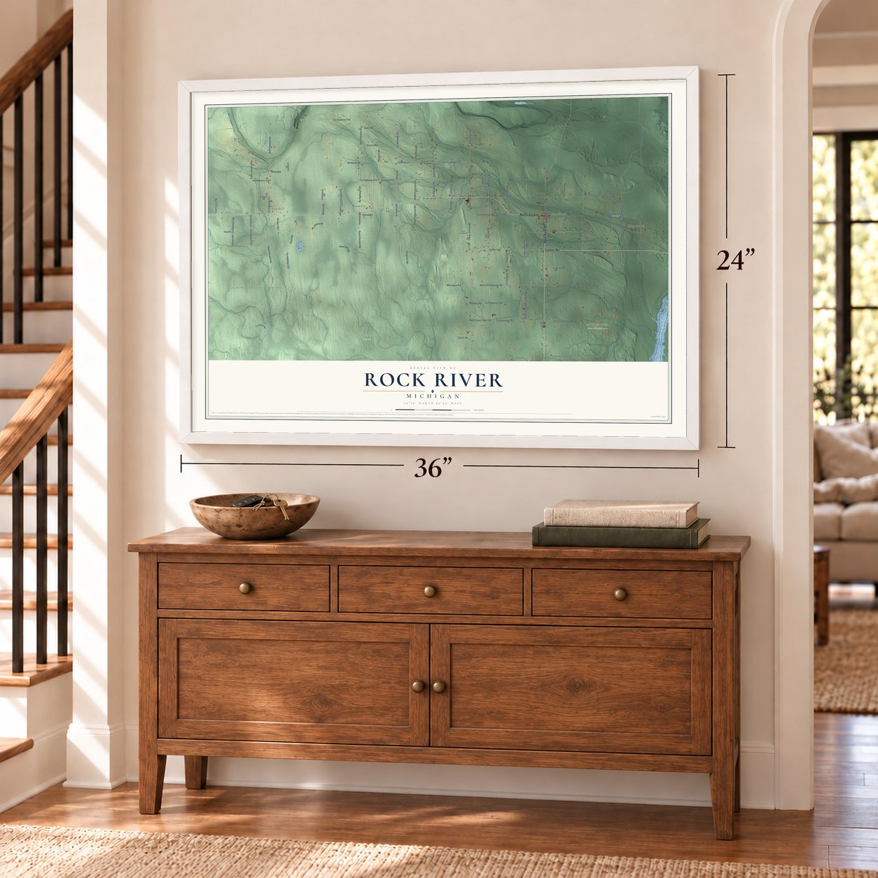 Rock River, Michigan map, 24 x 36 inch print in a white frame above a dresser by a staircase