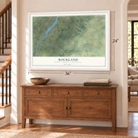 Rockland, Brown County, Wisconsin map, 24 x 36 inch print in a white frame above a dresser by a staircase