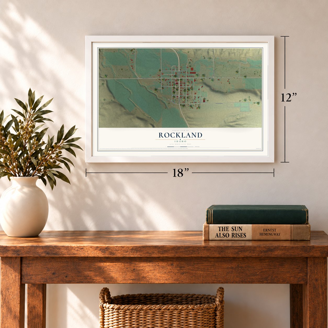 Rockland, Idaho map, 12 x 18 inch print in a white frame in an entryway