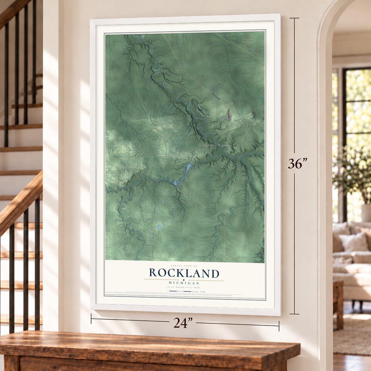 Rockland, Michigan map, 24 x 36 inch print in a white frame by a staircase