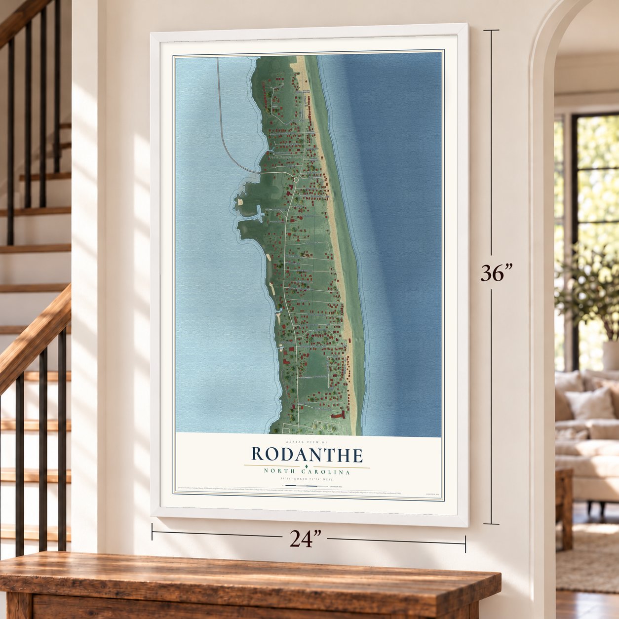 Rodanthe, North Carolina map, 24 x 36 inch print in a white frame by a staircase