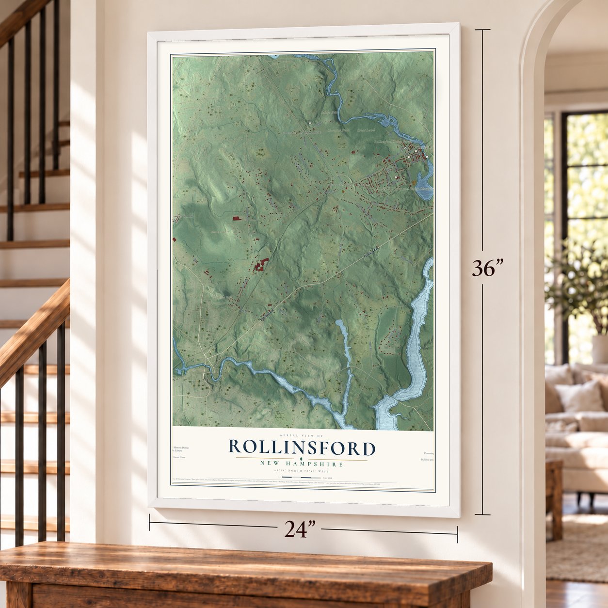 Rollinsford, New Hampshire map, 24 x 36 inch print in a white frame by a staircase