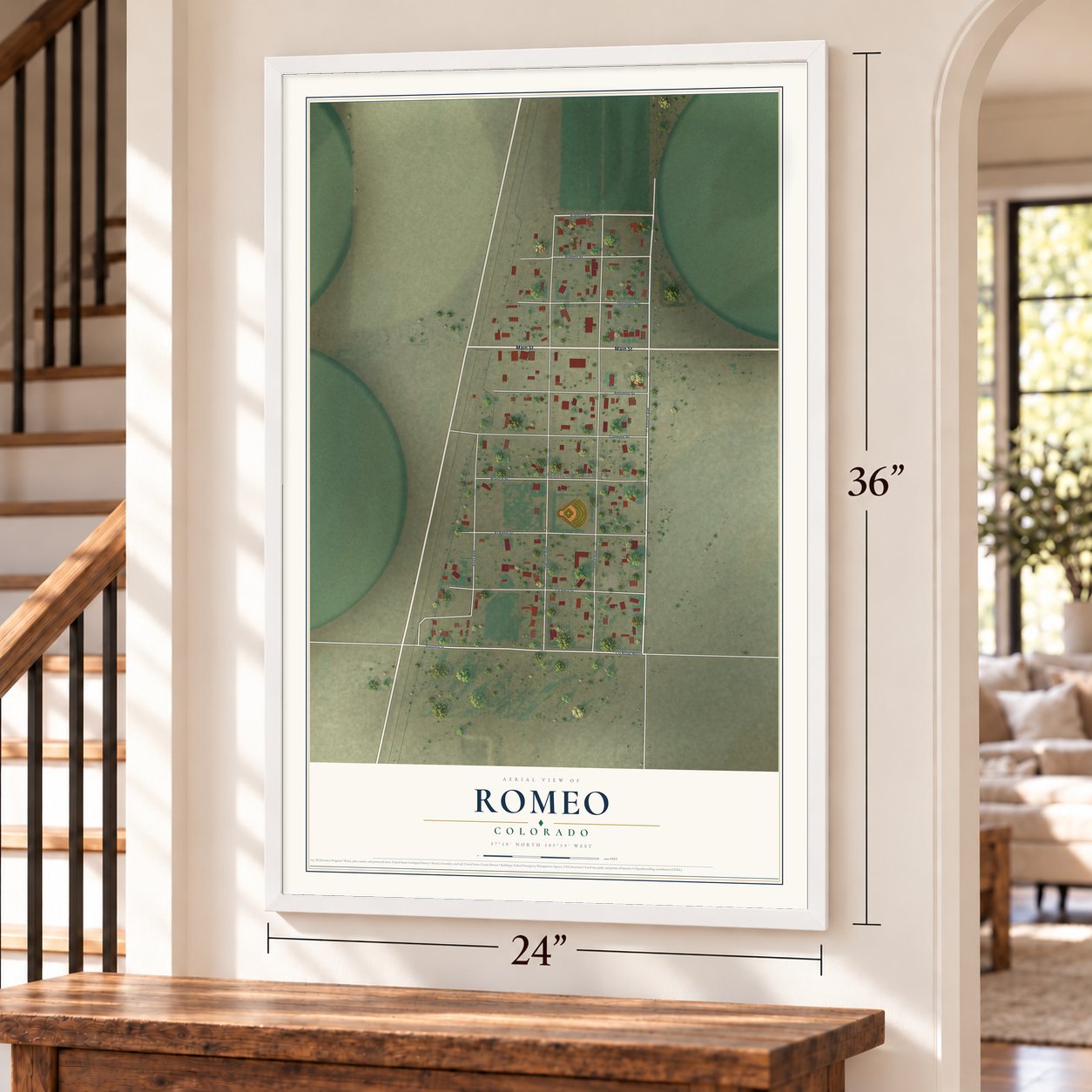 Romeo, Colorado map, 24 x 36 inch print in a white frame by a staircase