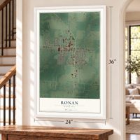 Ronan, Montana map, 24 x 36 inch print in a white frame by a staircase