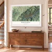 Ronceverte, West Virginia map, 24 x 36 inch print in a white frame above a dresser by a staircase