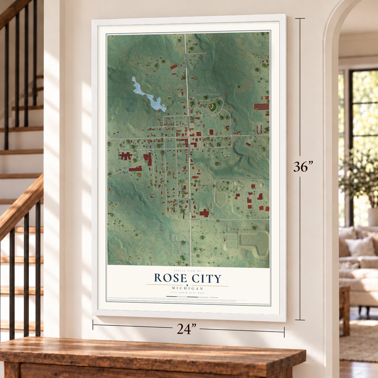 Rose City, Michigan map, 24 x 36 inch print in a white frame by a staircase