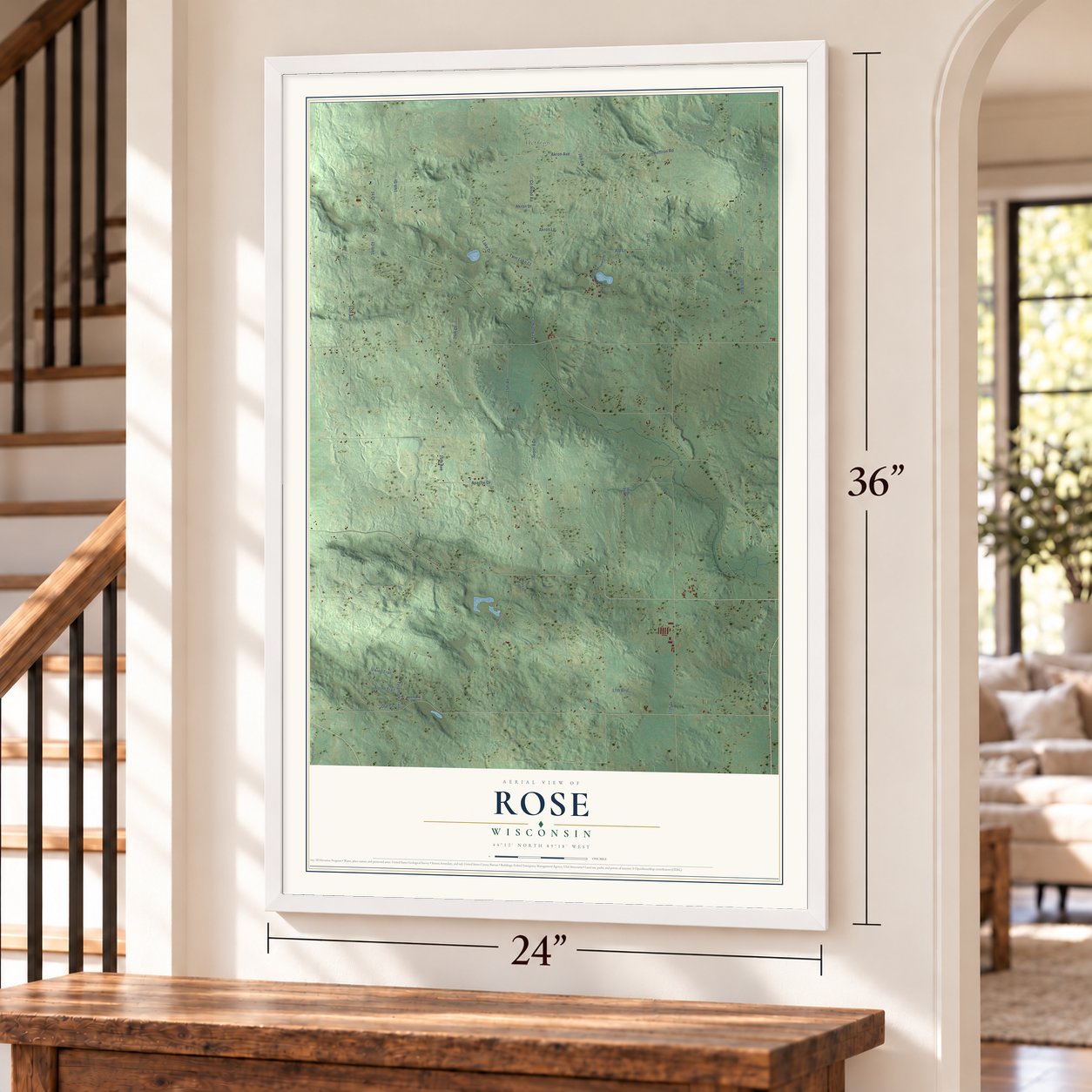Rose, Wisconsin map, 24 x 36 inch print in a white frame by a staircase